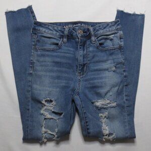AMERICAN EAGLE womens JEANS denim DISTRESSED stretch BLUE frayed hems SIZE 2